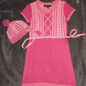 A pink knit dress with matching hat